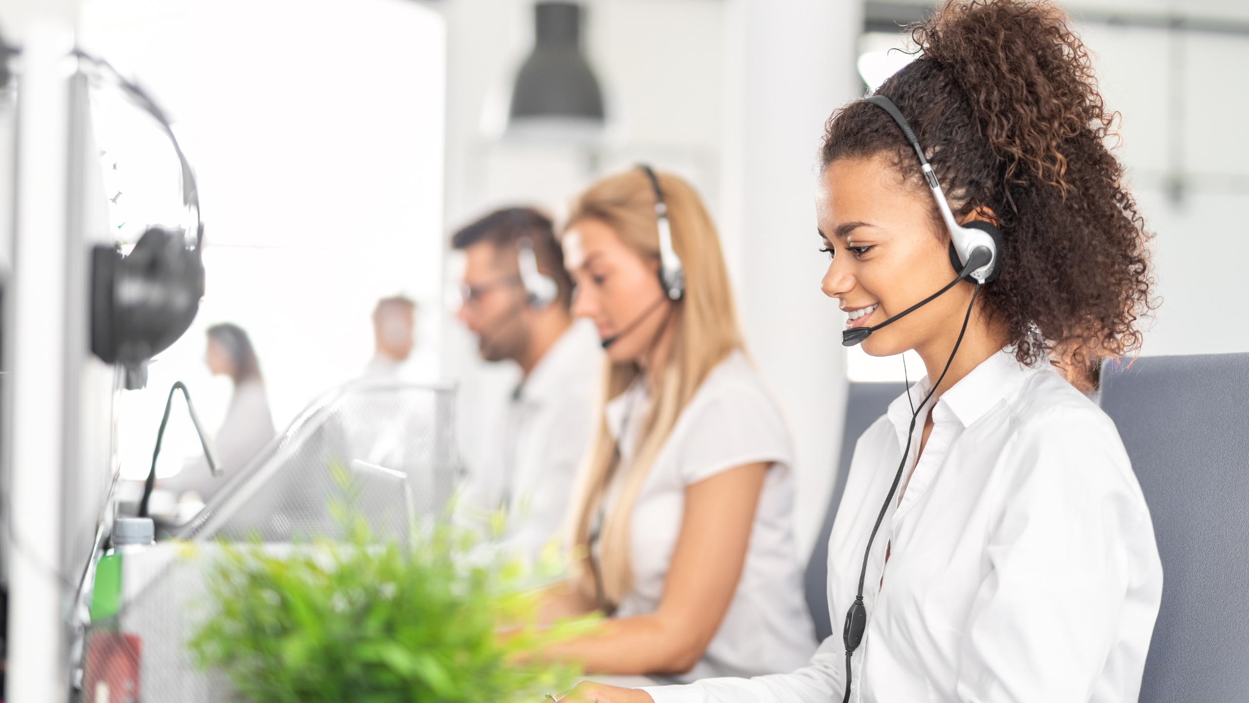 Retail business employee assisting a customer